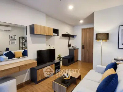 Modern living room with stylish furniture and warm lighting, perfect for cozy evenings.