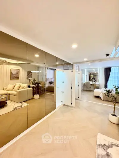 Luxurious modern living room with elegant decor and mirrored walls