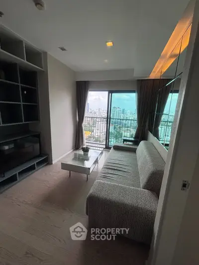 Modern living room with city view and stylish furniture