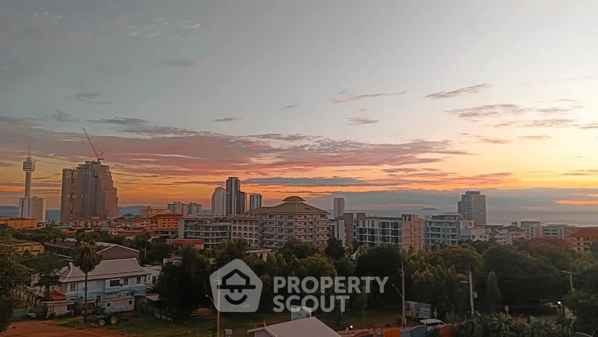 Stunning cityscape view at sunset showcasing modern architecture and vibrant skyline.