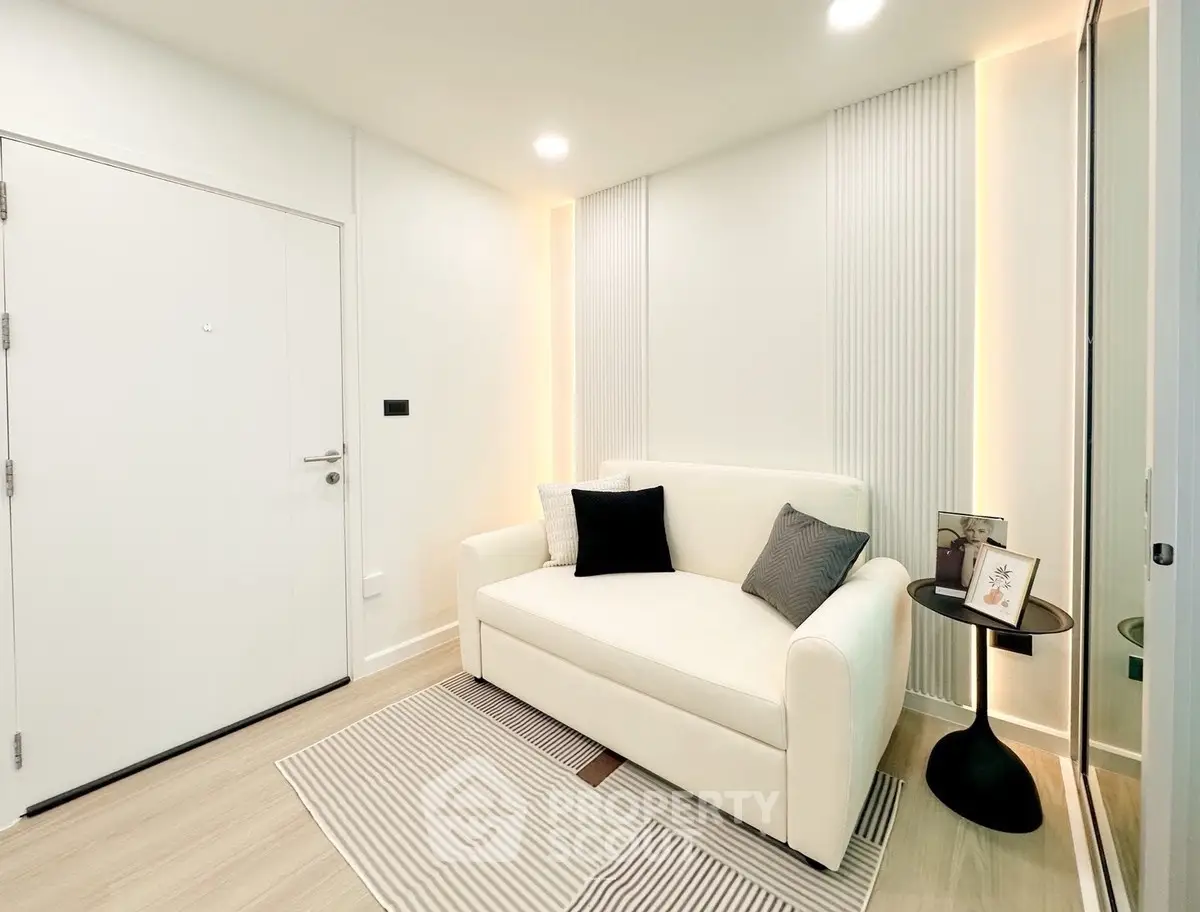 Modern living room with cozy white sofa and stylish decor