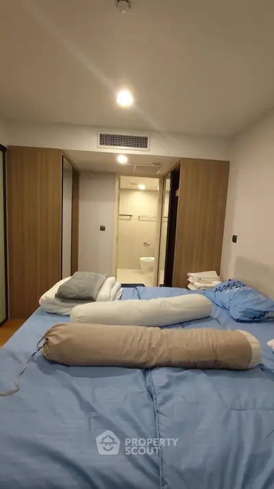 Cozy bedroom with ensuite bathroom and modern decor