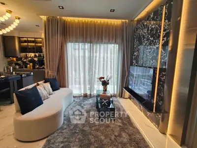 Luxurious living room with modern decor and elegant lighting