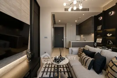 Modern living room with stylish decor and open kitchen layout