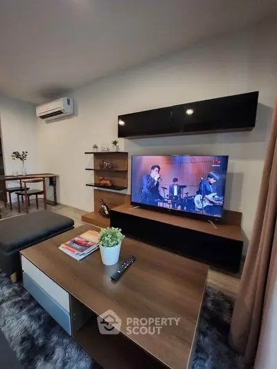 Modern living room with stylish furniture and entertainment setup