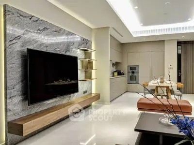 Luxurious modern living room with sleek kitchen, marble TV wall, and elegant dining area.