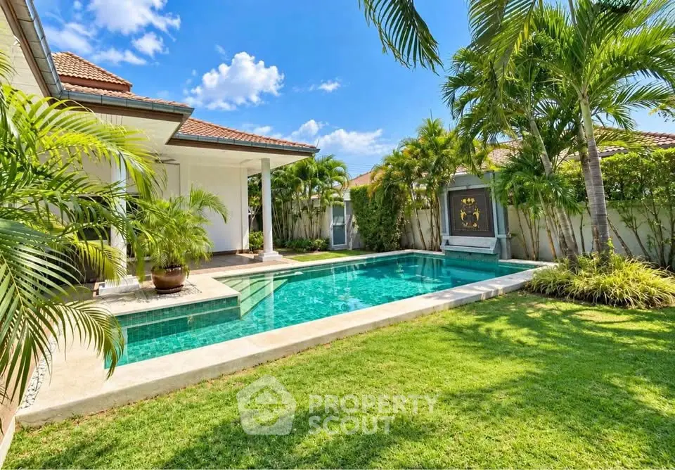Luxurious villa with private pool and lush garden in tropical paradise