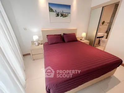 Cozy bedroom with modern decor and elegant lighting