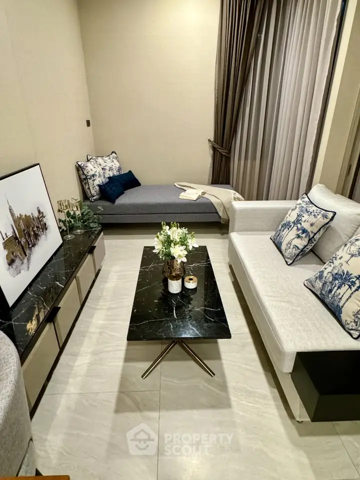 Elegant modern living room with stylish decor and cozy seating area, perfect for relaxation and entertainment.