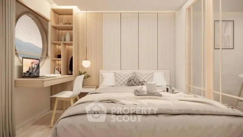 Modern bedroom with stylish decor and natural light, featuring a cozy bed and workspace.