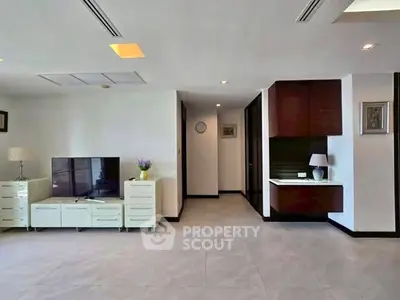 Spacious modern living room with sleek furniture and elegant decor