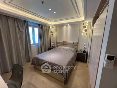 Luxurious modern bedroom with elegant lighting and stylish decor