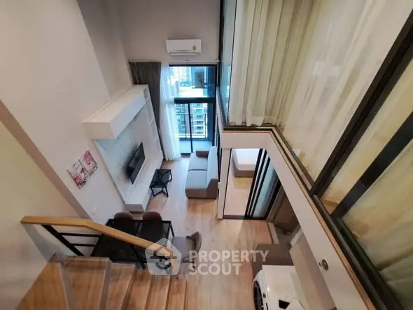 Modern loft apartment with high ceilings and stylish interior design