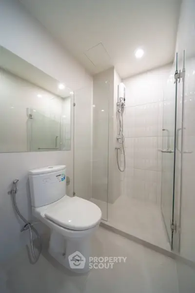 Modern bathroom with glass shower and sleek design