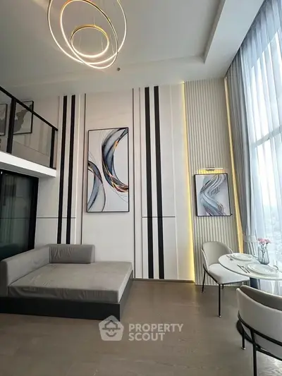 Modern living room with high ceiling and elegant decor