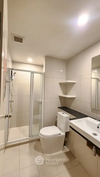 Modern bathroom with sleek shower and stylish fixtures