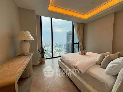 Luxurious bedroom with stunning city view and modern decor