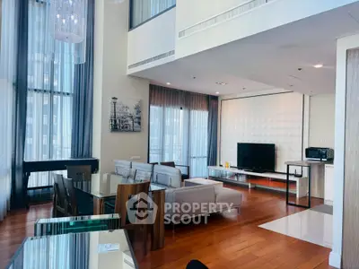 Luxurious modern living room with high ceilings and elegant decor