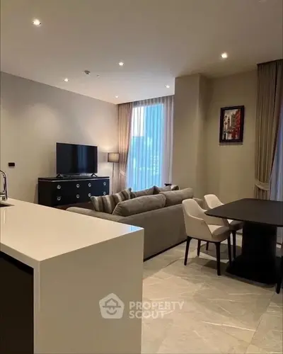 Modern living room with sleek furniture and open layout, perfect for stylish urban living.