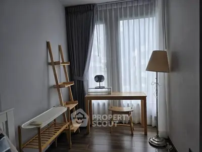Cozy study room with natural light and minimalist wooden furniture