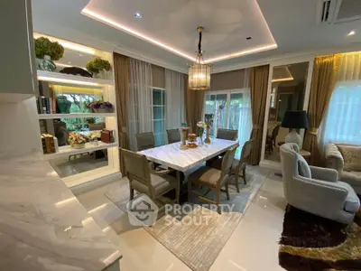 Luxurious dining room with elegant decor and large windows, perfect for entertaining guests.