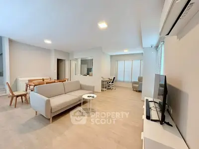 Spacious modern living room with open layout and stylish furniture
