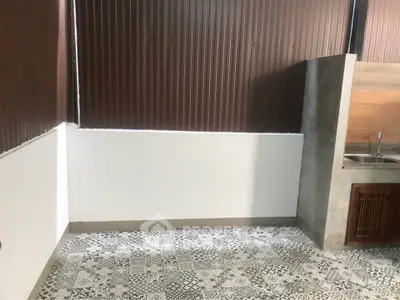 Modern kitchen with unique tile flooring and minimalist design