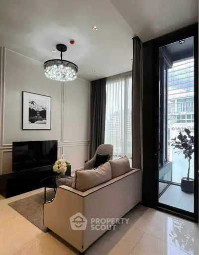 Luxurious living room with elegant decor and large windows offering city views.