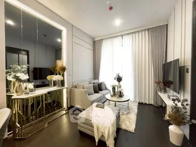 Luxurious modern living room with elegant decor and large window, perfect for relaxation.