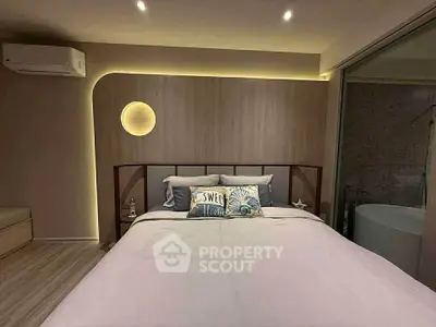 Modern bedroom with stylish lighting and cozy decor