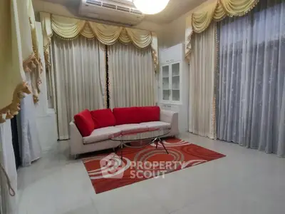 Elegant living room with stylish curtains and modern furniture