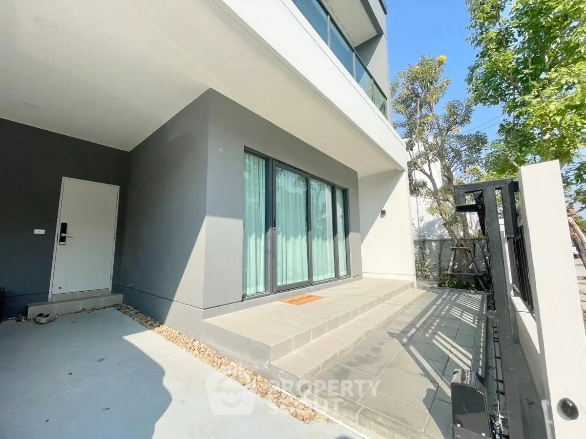 Modern building exterior with spacious entrance and sleek design