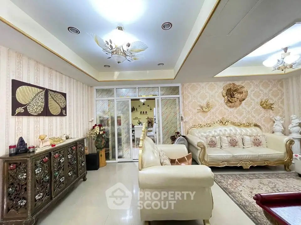 Luxurious living room with elegant decor and plush seating in a stylish home.