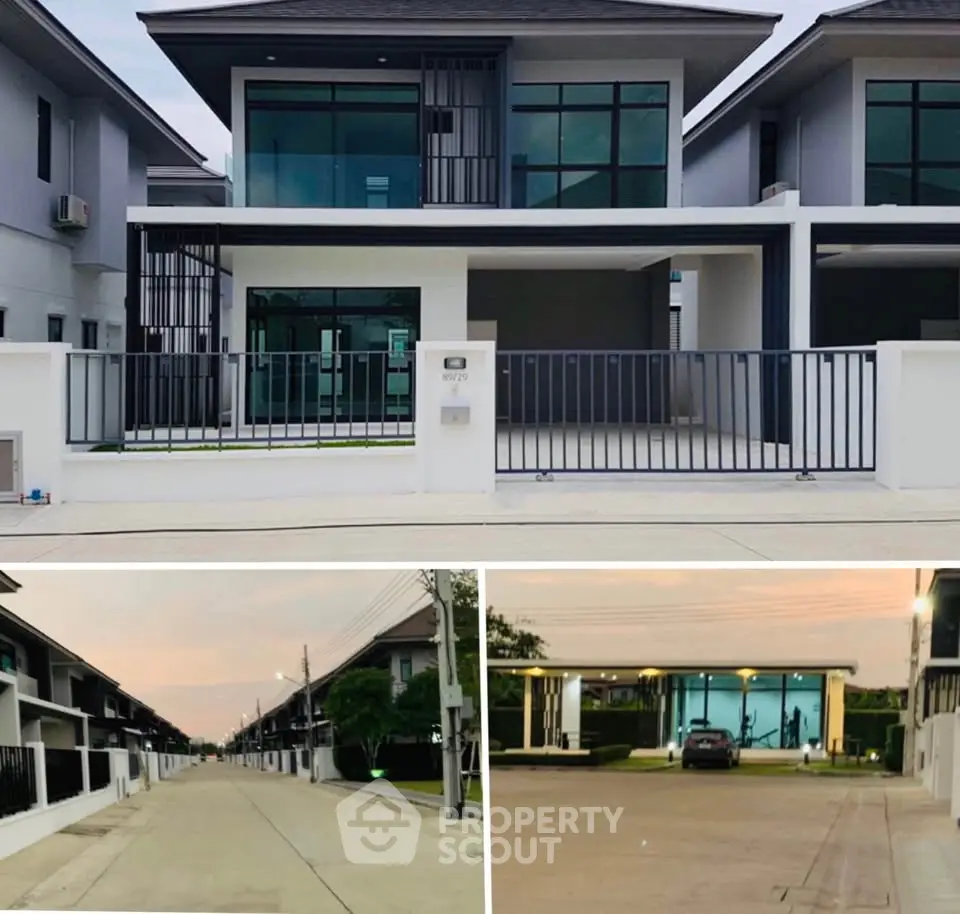 Modern two-story house with sleek design and spacious driveway in a serene neighborhood.