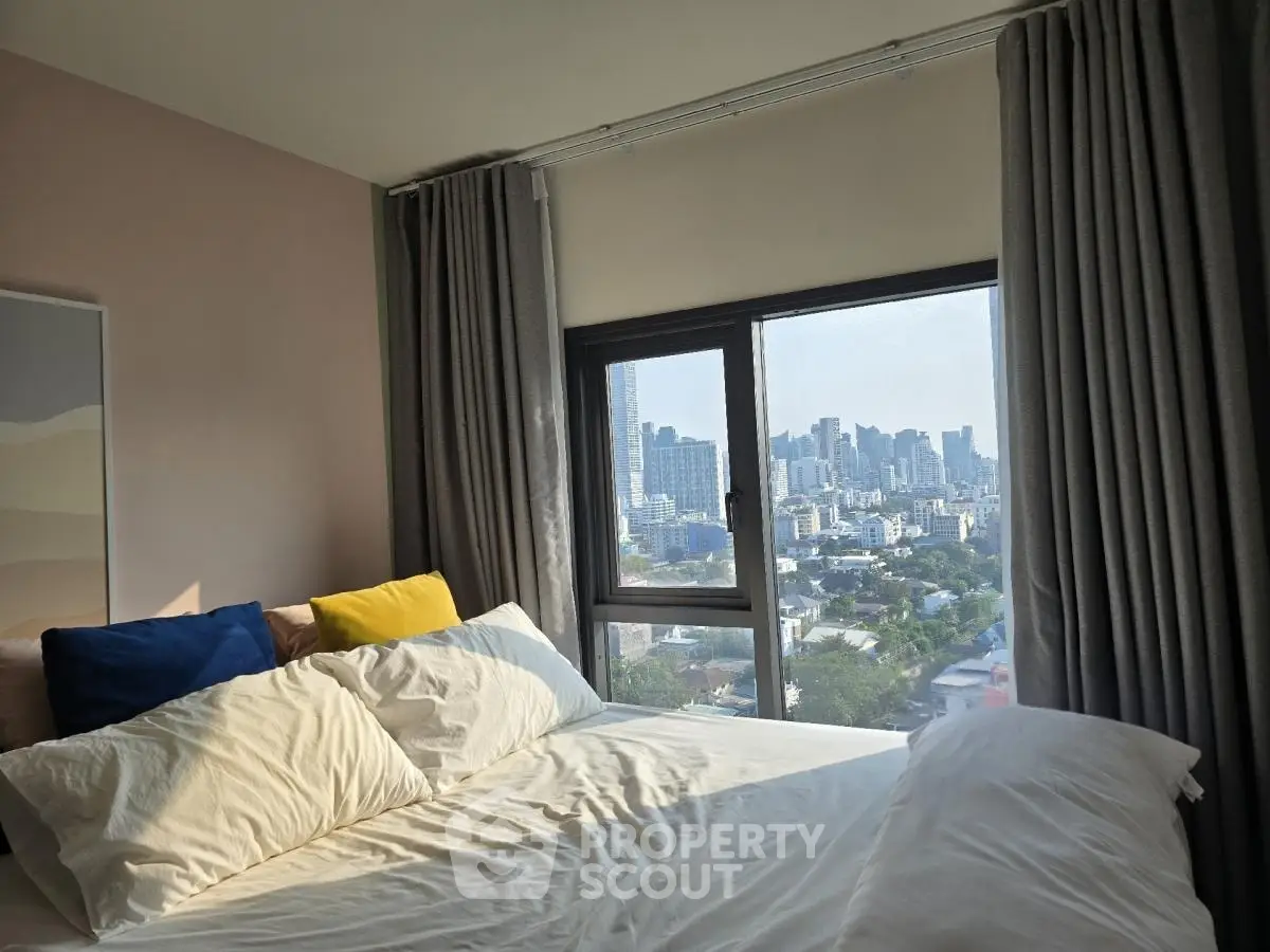 Modern bedroom with city view and stylish decor