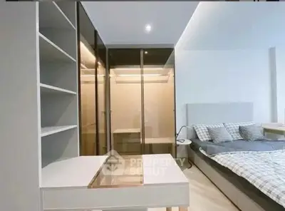 Modern bedroom with stylish wardrobe and cozy bed setup