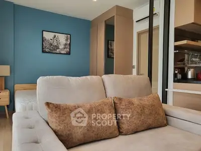 Modern living room with cozy sofa and stylish decor