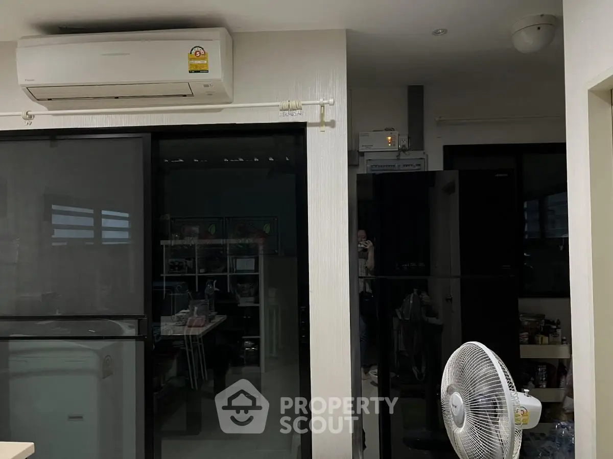 Modern interior with air conditioning and fan in a cozy living space
