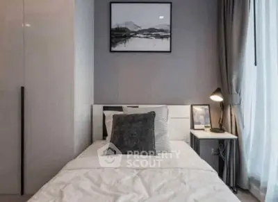 Cozy bedroom with modern decor and natural light