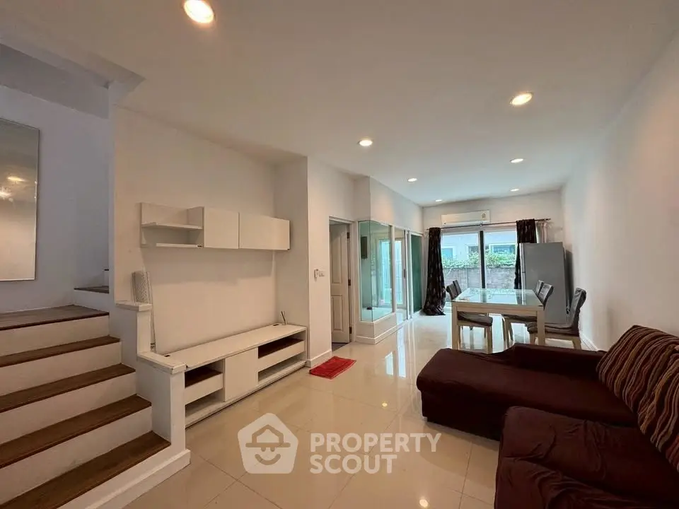 Spacious modern living room with open layout and stylish furniture