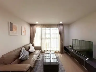 Stylish living room with modern decor and large TV unit