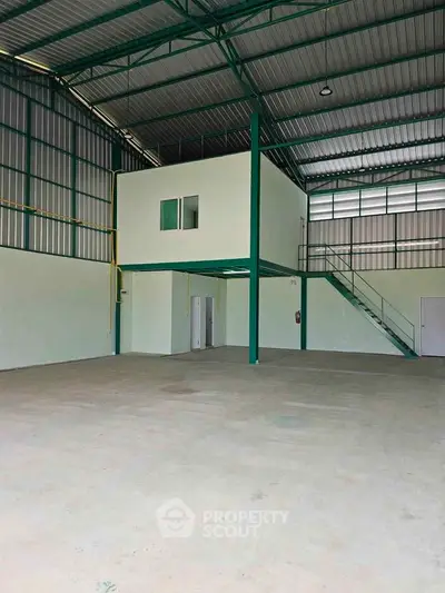 Spacious industrial warehouse with mezzanine office and high ceilings