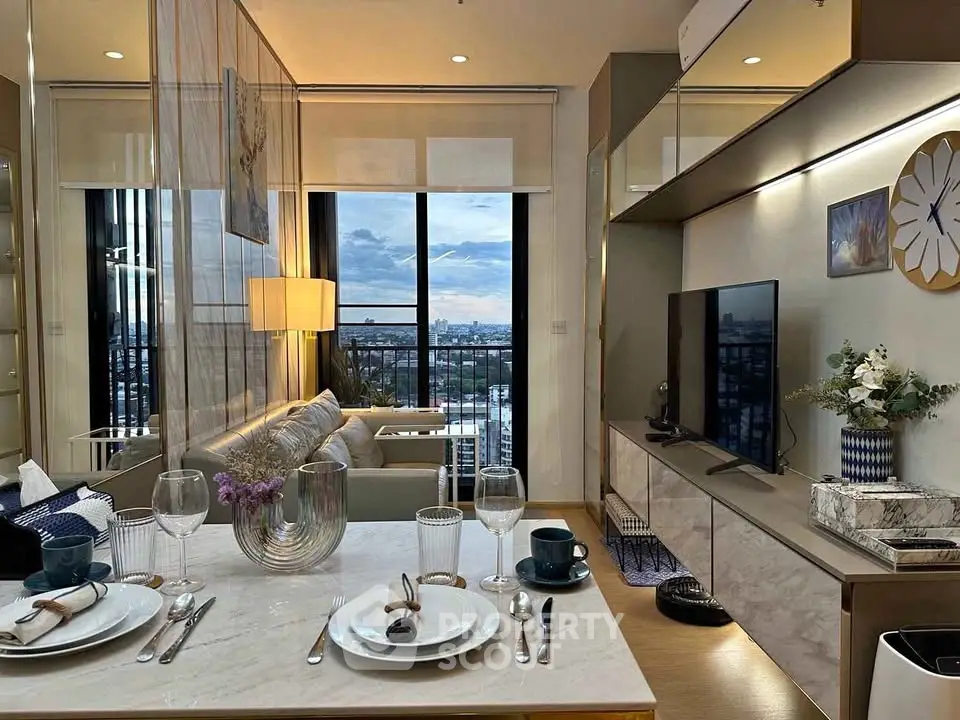 Modern living room with city view, elegant dining setup, and stylish decor in a high-rise apartment.