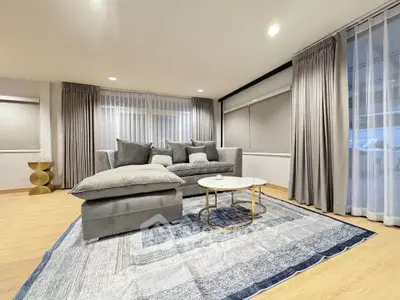 Spacious modern living room with elegant decor and plush seating