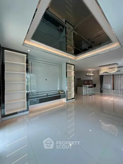 Luxurious modern living room with sleek design and elegant lighting features.