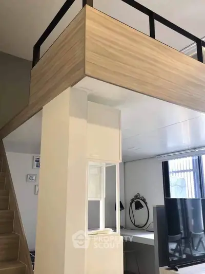 Modern loft apartment with stylish mezzanine and sleek interior design