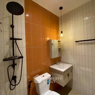 Modern bathroom with stylish shower and sleek sink design