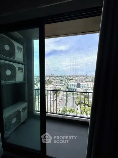 Stunning balcony view with cityscape and air conditioning units, perfect for urban living.