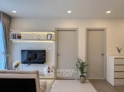 Modern living room with sleek TV setup and stylish decor