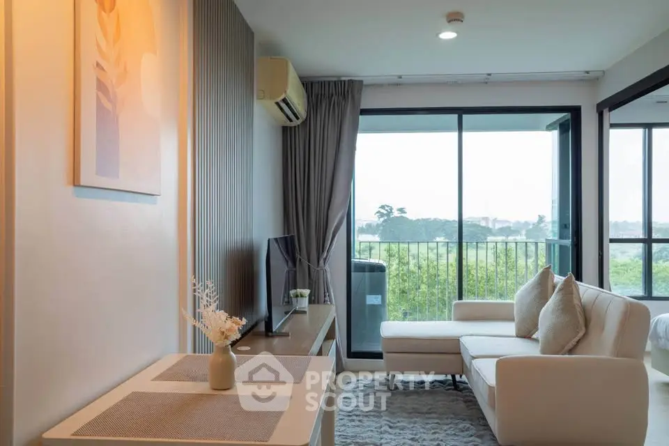 Modern living room with balcony view and stylish decor